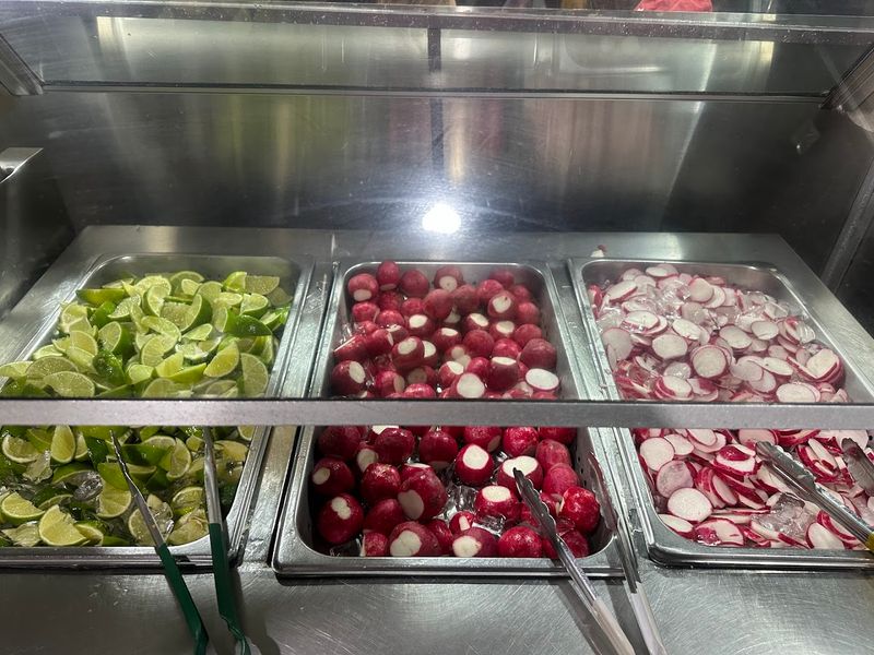 Fresh Radishes And Limes On The Garnish Side Of The Counter
