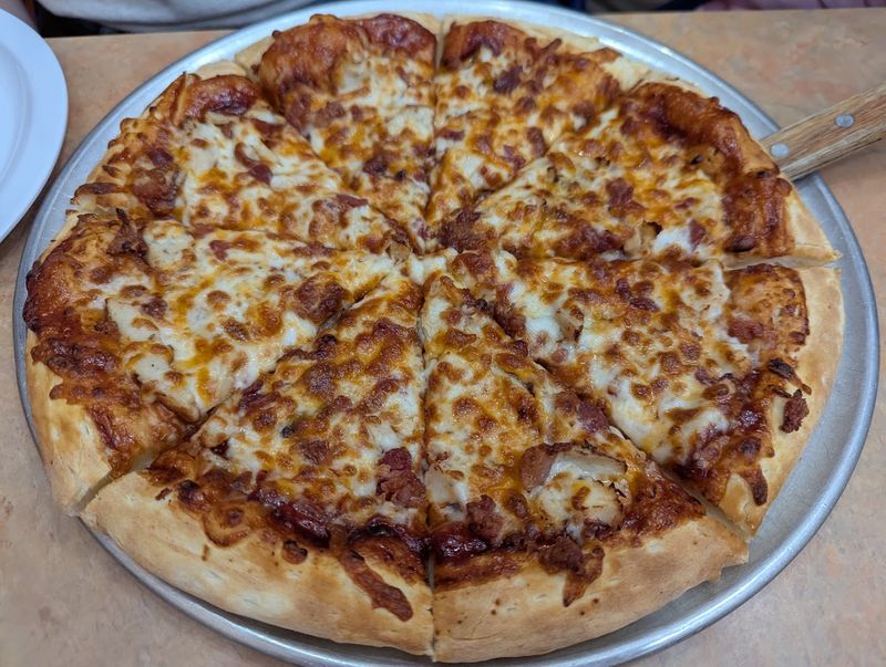 13 Kansas Pizza Destinations That Make The Road Trip Worth It - Decor Hint Tossed N Sauced Pizza