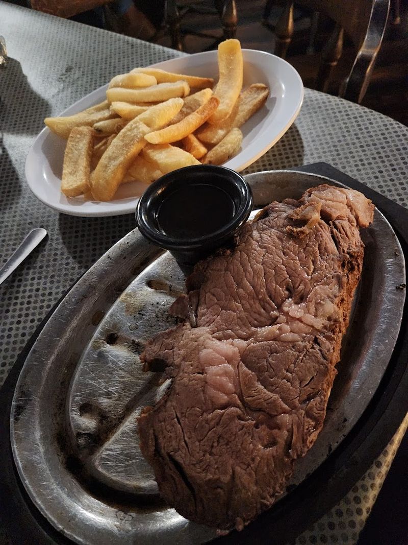 This Quiet North Carolina Steakhouse Builds Its Menu Around Big, Juicy Steaks - Decor Hint Charcoal Grilled Steaks That Define The Experience