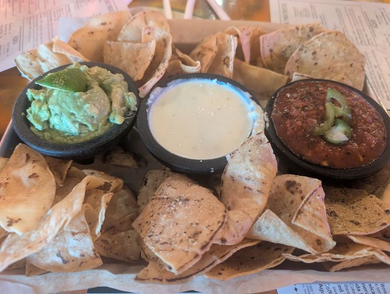 Freshly Made Chips Served With Salsa, Guacamole, and Cheese Dip