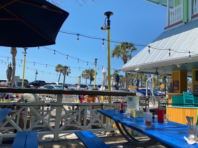 This Florida Beachfront Restaurant Makes A Grouper Sandwich You Won't Forget - Decor Hint Pet Friendly And Welcoming