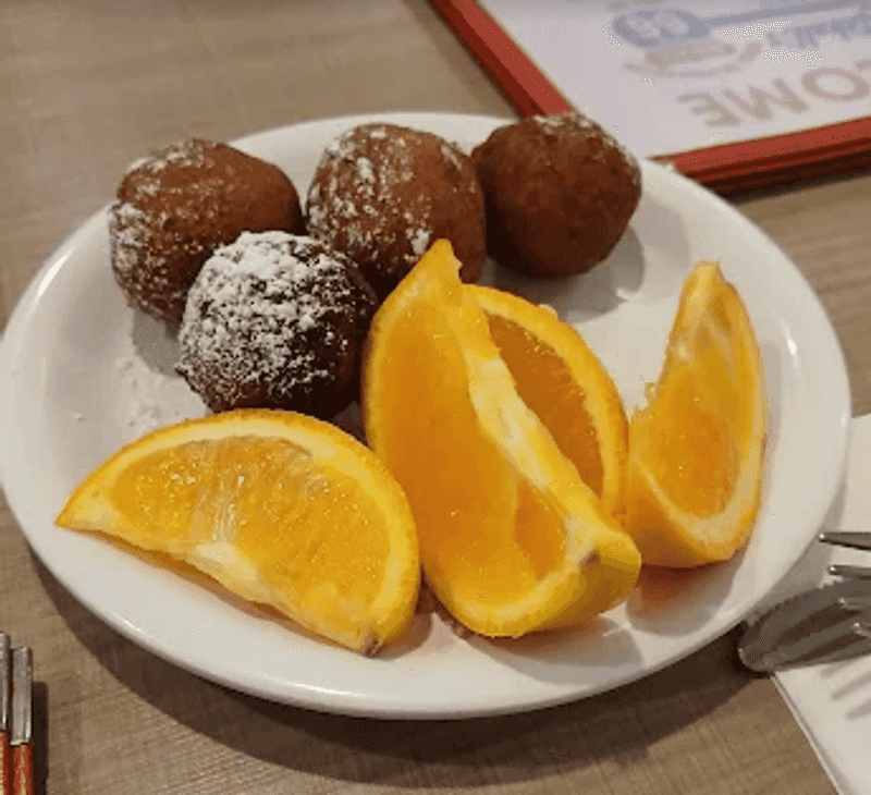 This Cozy Illinois Diner Still Serves Breakfast The Old-Fashioned Way - Decor Hint The Donut Holes And Milk Duds Tradition