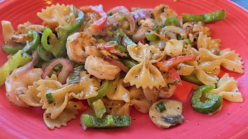 Noodles And Vegetables Keep The Grill Line Moving