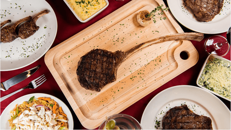 The Bone-In Ribeye At This North Carolina Steakhouse Is So Good, It's Worth A Drive - Decor Hint Cowboy-Cut Flavor Gives The Steak Its Big Reputation