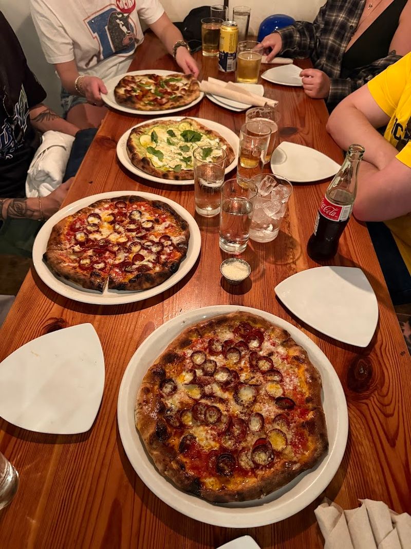 This Famous North Carolina Pizza Spot Prepares Food In A Wood-Fired Oven - Decor Hint Inclusive Options For Every Diner