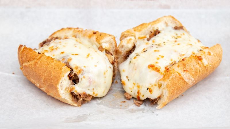 The Cheesesteaks At This Illinois Restaurant Keep Customers Coming Back Constantly - Decor Hint The Cheese Pull Is A Legitimate Highlight