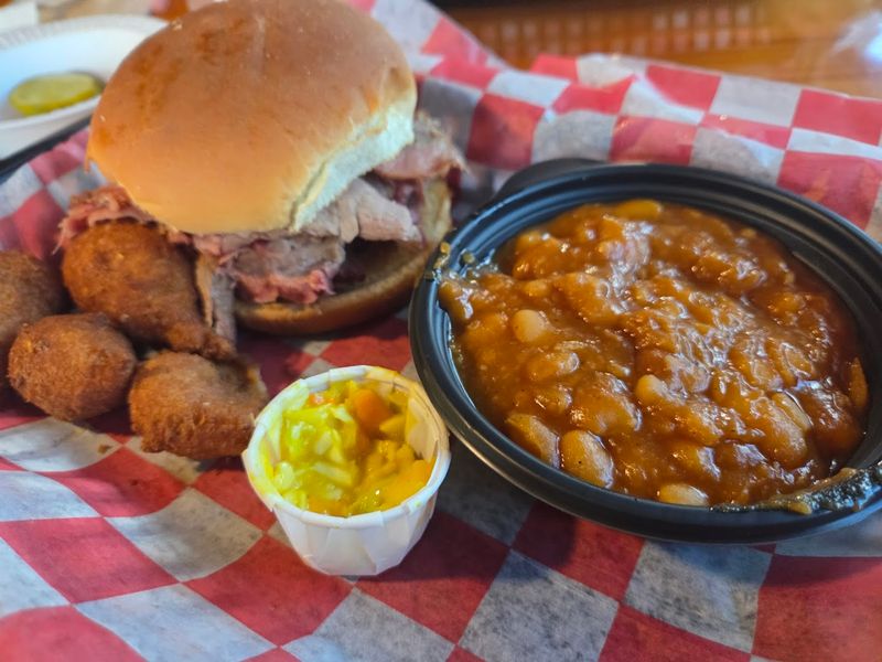 Pulled Chicken Sandwich Dripping With BBQ Sauce