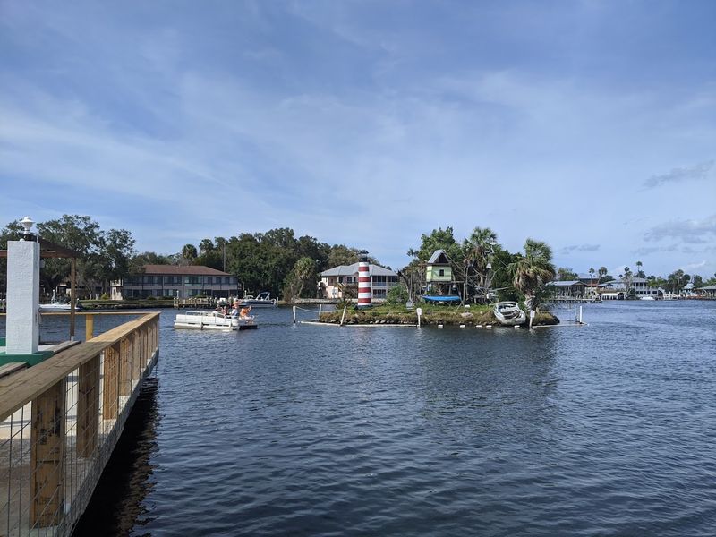Viewing The Island From Shore Versus By Boat