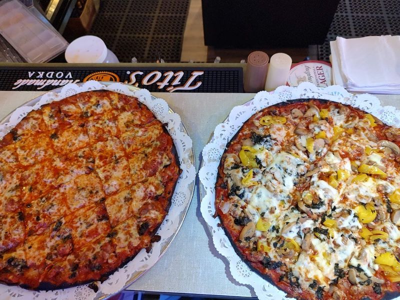 The Wisconsin Restaurant Where Pizza Has Been Stealing The Spotlight For Years - Decor Hint The Giardiniera Pizza That Keeps People Coming Back