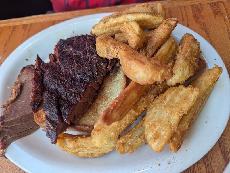 Slow-Smoked Brisket Gives The Place Its Main Hook