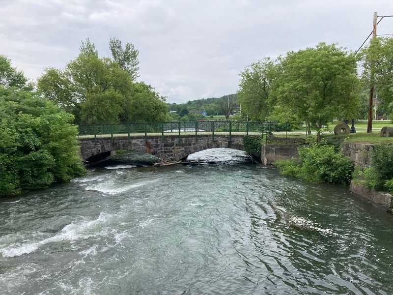 A Scenic River Walk Filled With Waterfalls And Views
