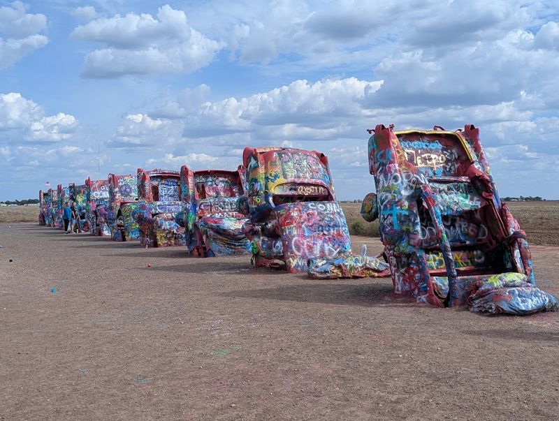 The Story Behind Ten Buried Cadillacs