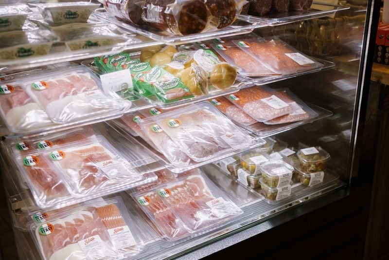 A Curated Selection Of Italian Cheeses And Salami
