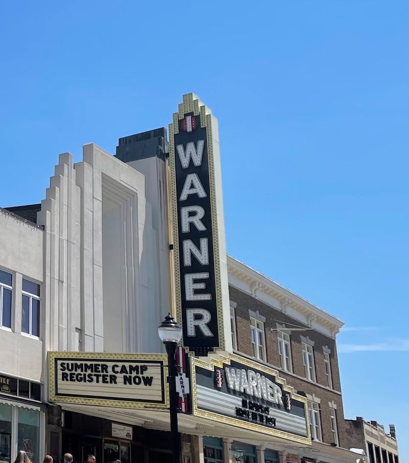 The Historic Warner Theatre And Local Arts Scene