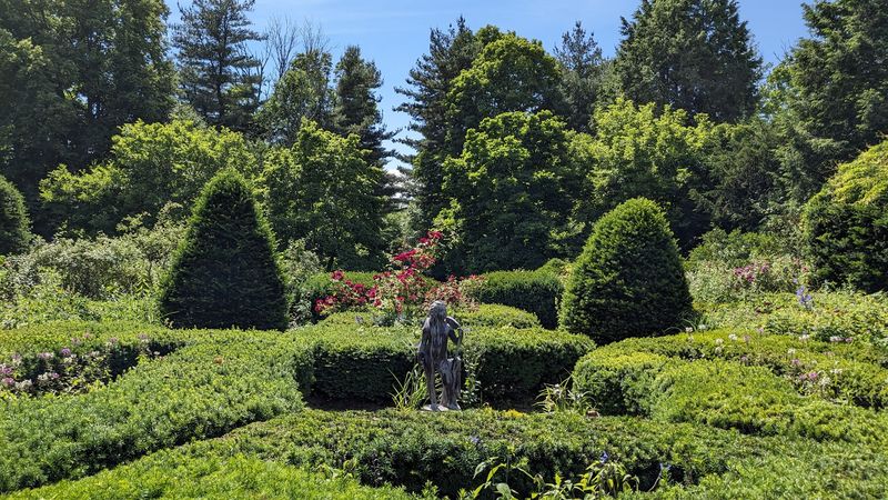 Stroll Past Blooms, Paths, And Old-World Charm