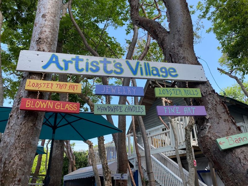 The Rain Barrel Artisans Village Hiding Right Behind Her