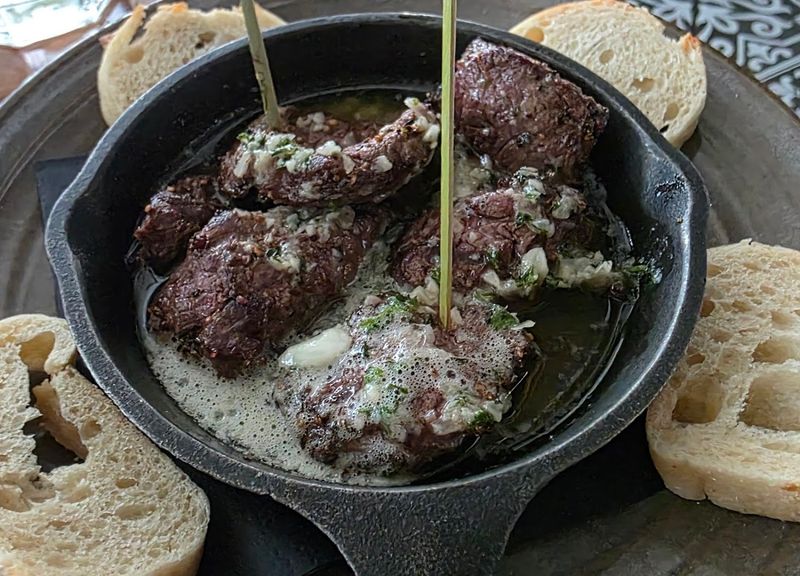 French-Inspired Pub Food With A Dark Storybook Twist