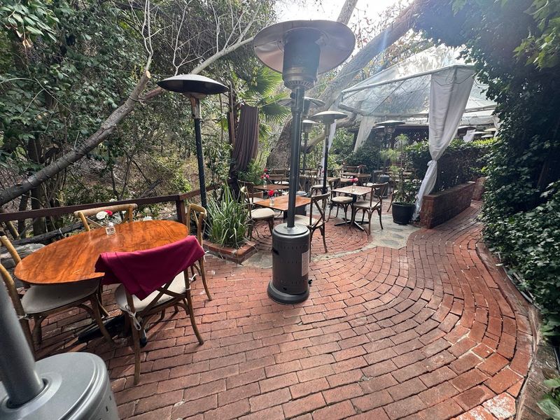 This Dreamy California Restaurant Lets You Dine Beneath Grand Sycamore Trees - Decor Hint Brick Pathways Through The Grounds