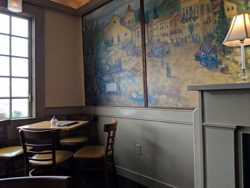 This Charming Bakery Is One Of Rhode Island's Sweetest Surprises - Decor Hint The European Cafe Vibe Is Real