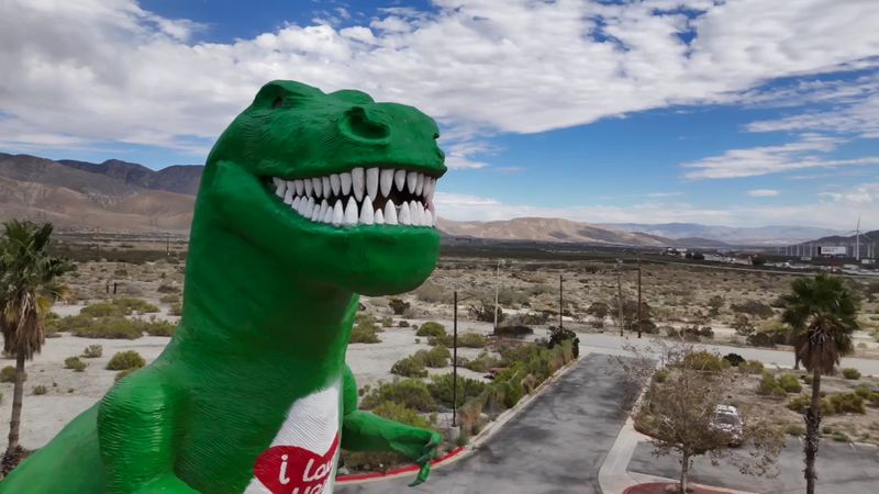Claude Bell Built The Dinosaurs To Catch Travelers' Attention