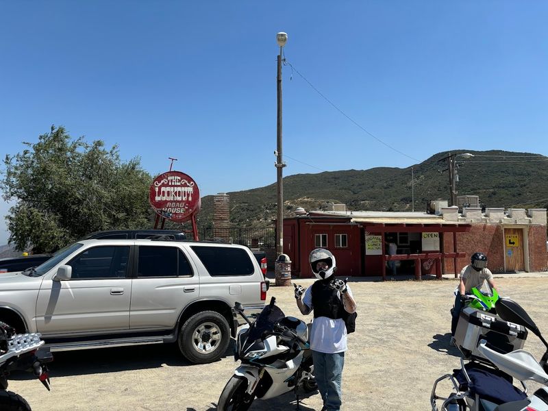 The Red Roadhouse Sign Feels Made For A Road Trip Photo
