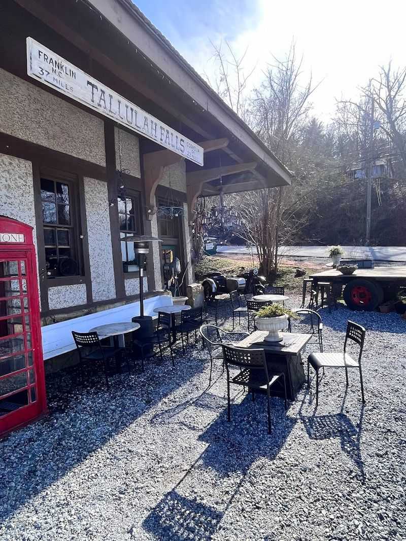 Outdoor Seating With A Friendly Feline Neighbor