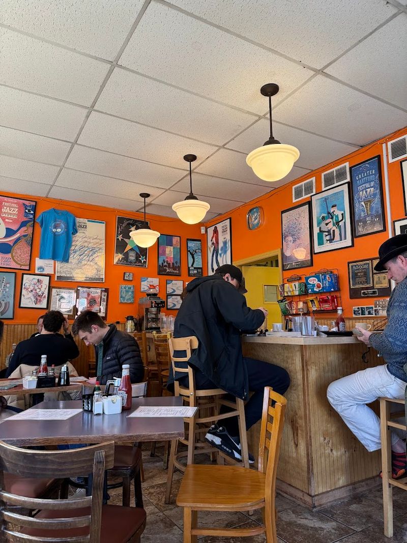 This Charming Connecticut Restaurant Is Drawing Crowds For Its Standout Brunch - Decor Hint The Jazz-Filled Atmosphere That Sets The Mood