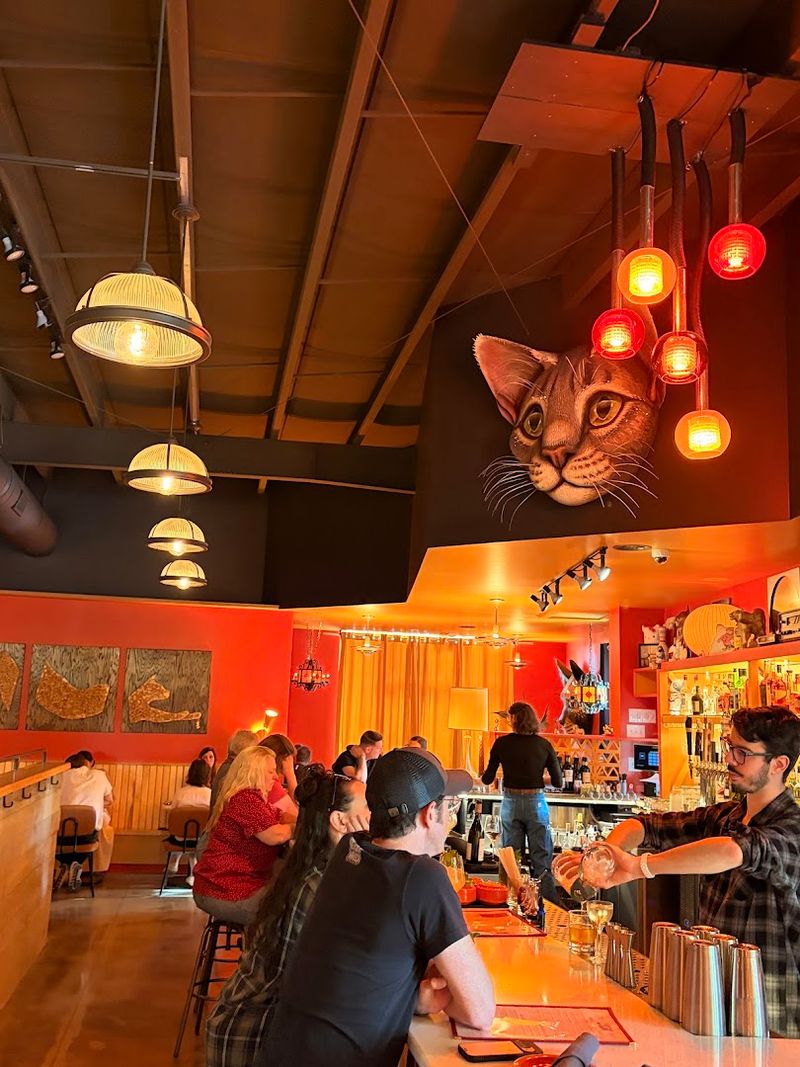 The Cat Décor Is Not Subtle, And That Is The Fun Part