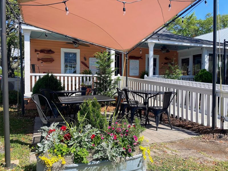 This Southeastern North Carolina Pizza Spot Serves Brick-Oven Pizzas Under The Southport Water Tower - Decor Hint A Historic Building Gives Dinner Extra Character