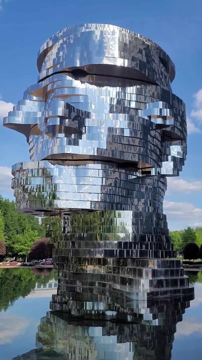The Sculpture Can Shift From Human Face To Abstract Puzzle