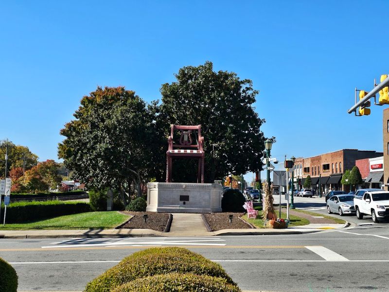 Railroad Tracks And Downtown Buildings Frame The Oddball Scene