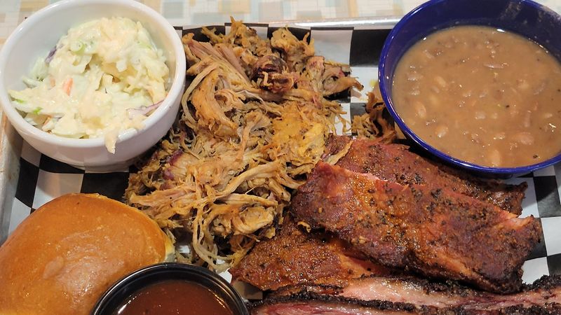 A Real Smokehouse Out Back Doing Serious BBQ