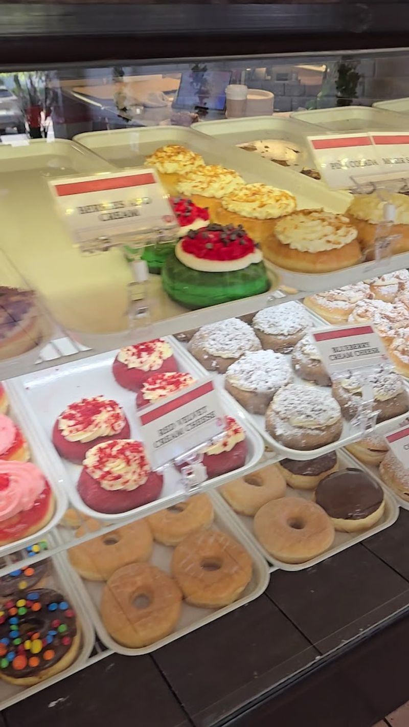The Red Velvet Donut That Stands Out In The Display Case