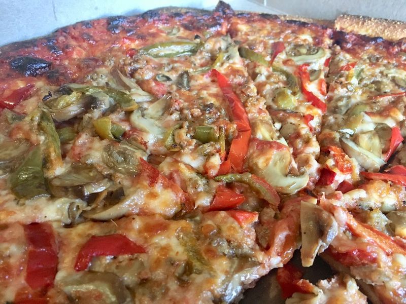 This Connecticut Pizza Spot Is So Loved It Often Sells Out Before The Night Ends - Decor Hint Sauce That Steals The Show