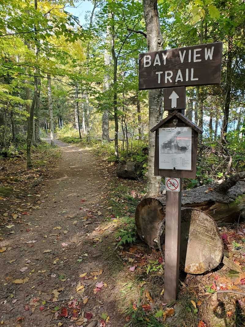 This Scenic 2-Mile Hike In Wisconsin Takes You Past Beautiful Caves And A Hidden Waterfall - Decor Hint Bay View Trail Along The Shoreline