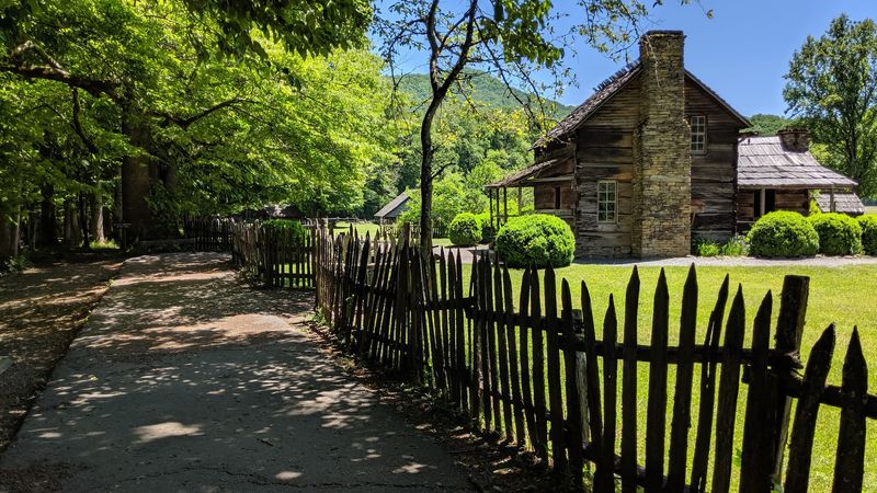 This North Carolina Mountain Farm Museum Feels Like Walking Into Appalachian History - Decor Hint Split-Rail Fences Make The Setting Feel Like A Mountain Homestead