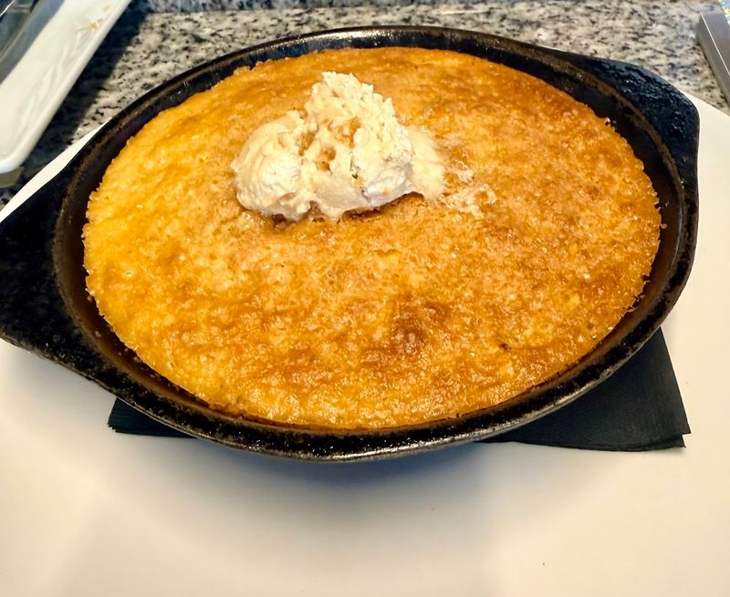 Complimentary Cornbread Served In Its Own Skillet With Bourbon Sorghum Butter