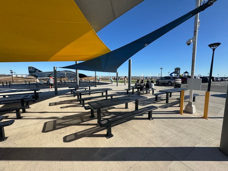 Picnic Tables Let Families Turn Plane-Spotting Into Lunch Plans