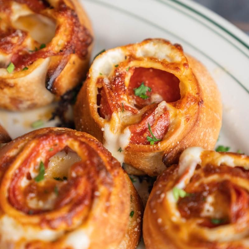 This North Carolina Pizzeria Serves Pizza Pinwheels That Look Like Cheesy Little Spirals - Decor Hint One Order Of Pinwheels Can Hijack The Whole Table