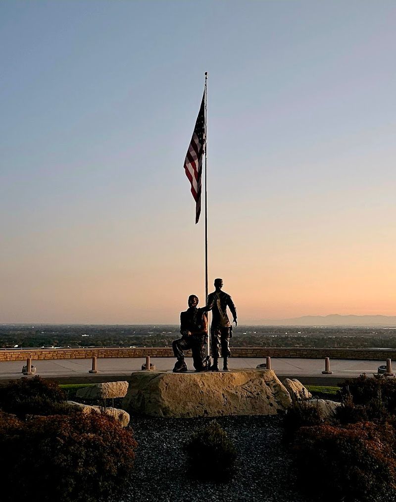 Stand Beneath The Flag That Watches Over The Grounds