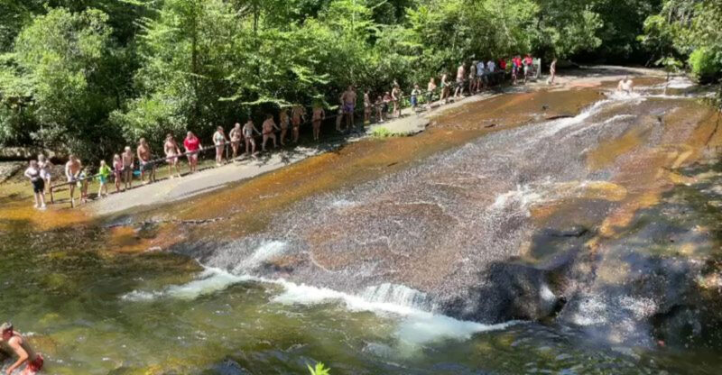 This North Carolina Waterfall Lets You Slide Straight Into A Mountain Pool