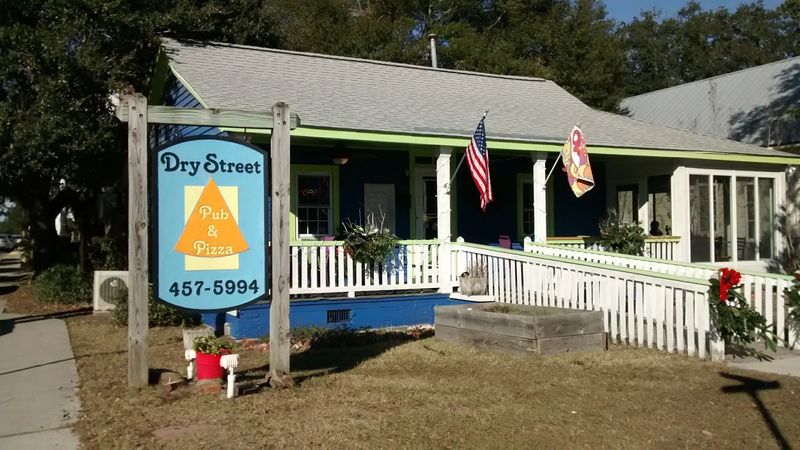 This Southeastern North Carolina Pizza Spot Serves Brick-Oven Pizzas Under The Southport Water Tower - Decor Hint The Water Tower Makes This Pizza Stop Easy To Spot