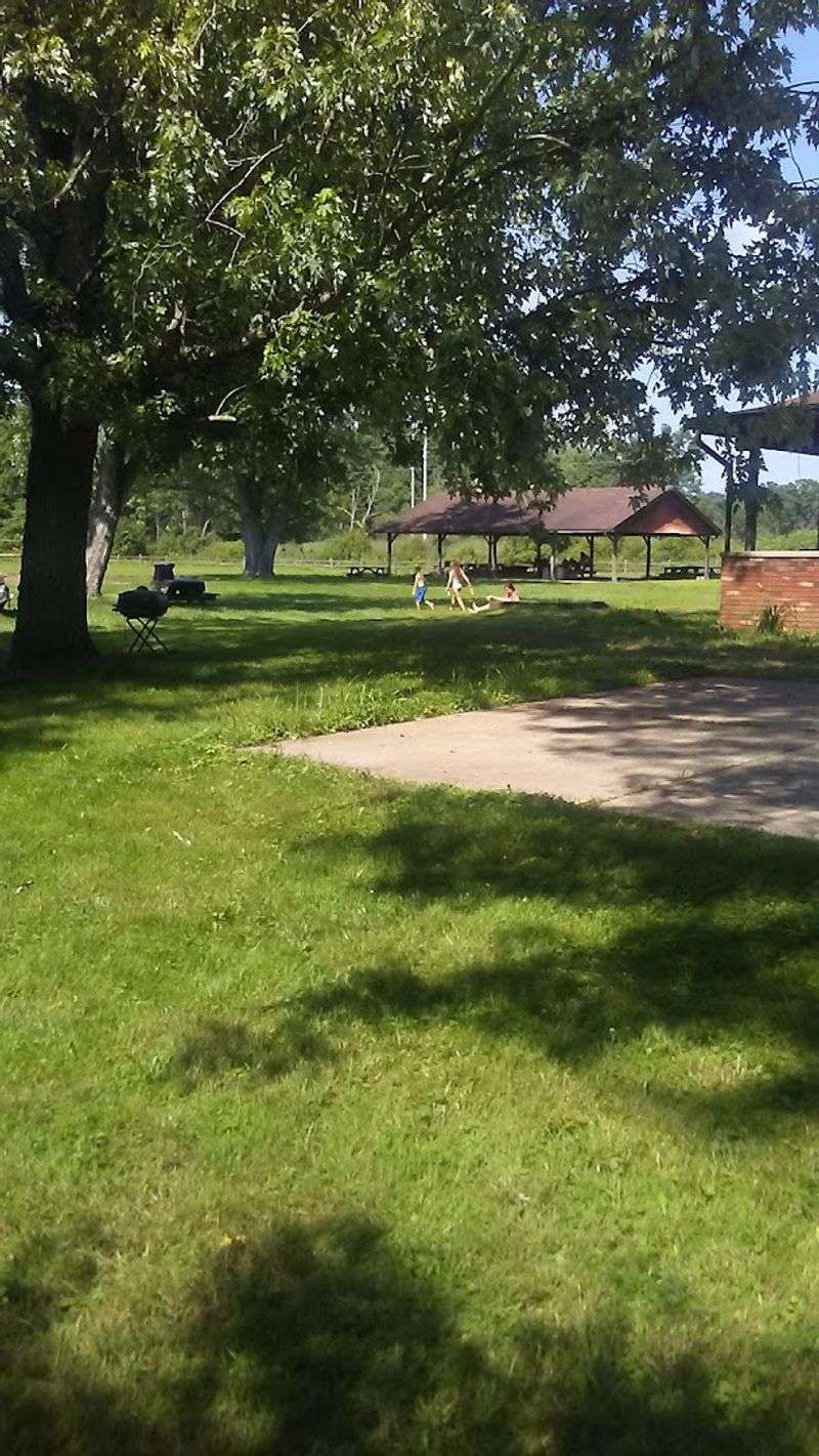 Walking Trails And Basketball Courts Beyond The Water