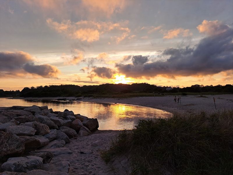 Stay For Sunset Over The Water