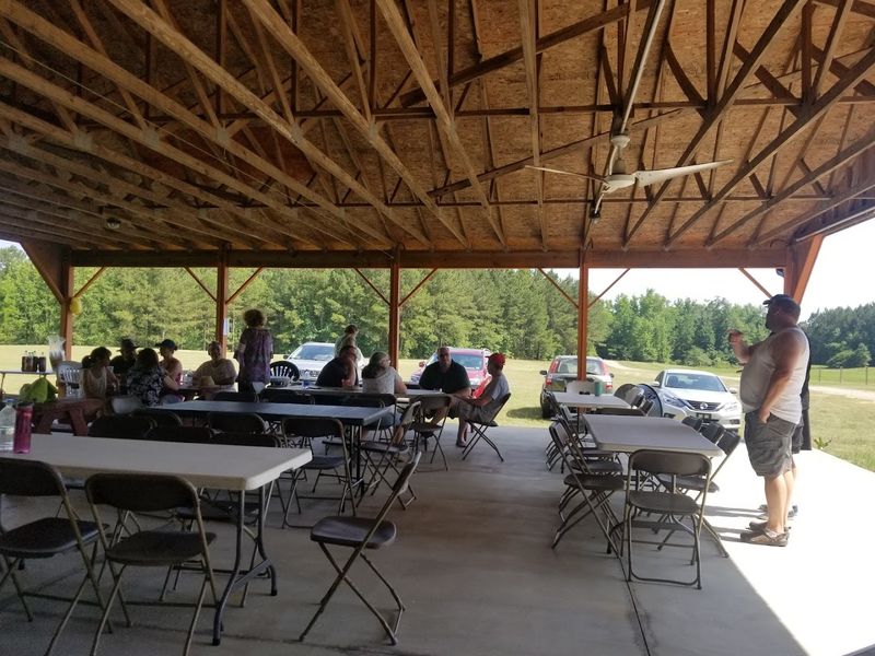A Pavilion With Grills For Outdoor Meals And Gatherings