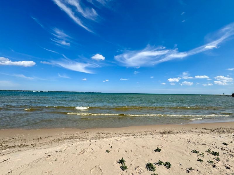 Swimming And Sunbathing At Whitefish Dunes Nearby