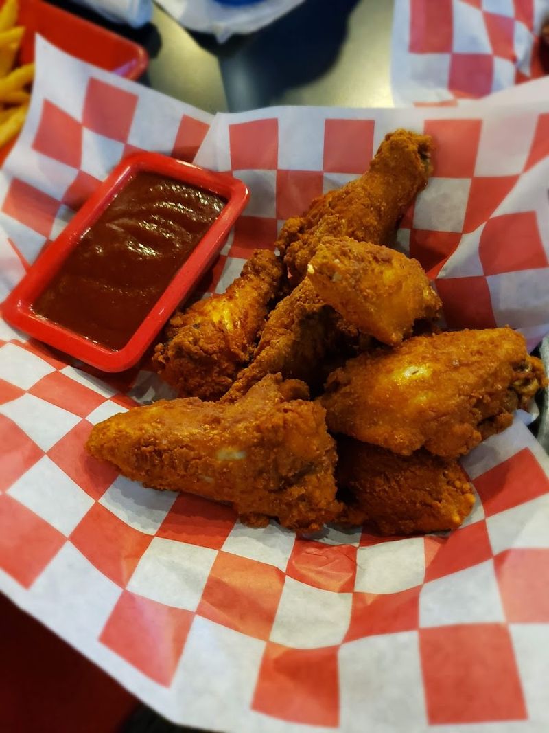 The Wonderfully Quirky Restaurant In Nebraska You'll Want To Visit Over And Over Again - Decor Hint Broasted Chicken That Has Earned Legendary Status On The Menu