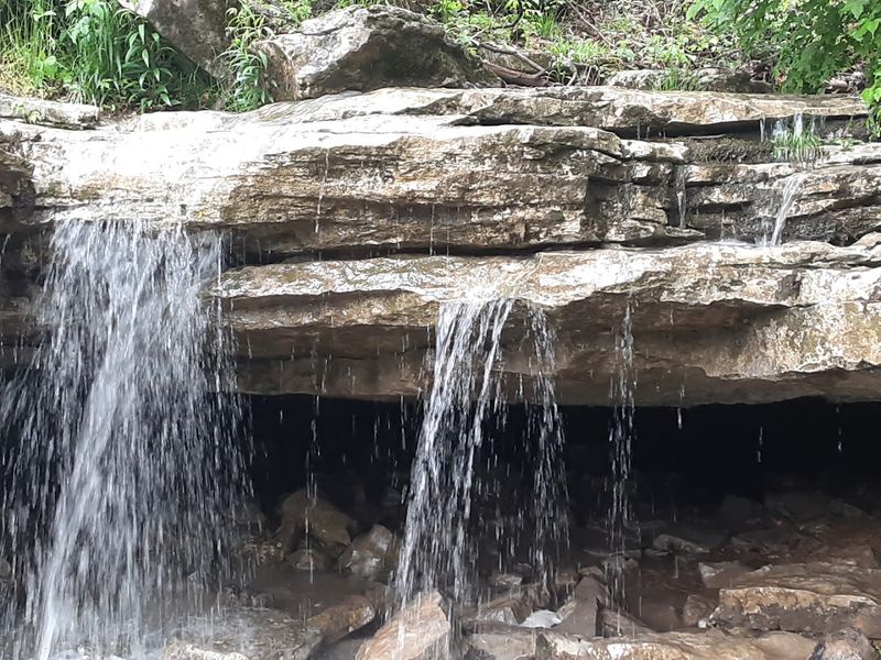 The Waterfall Above The Opening Adds Real Drama