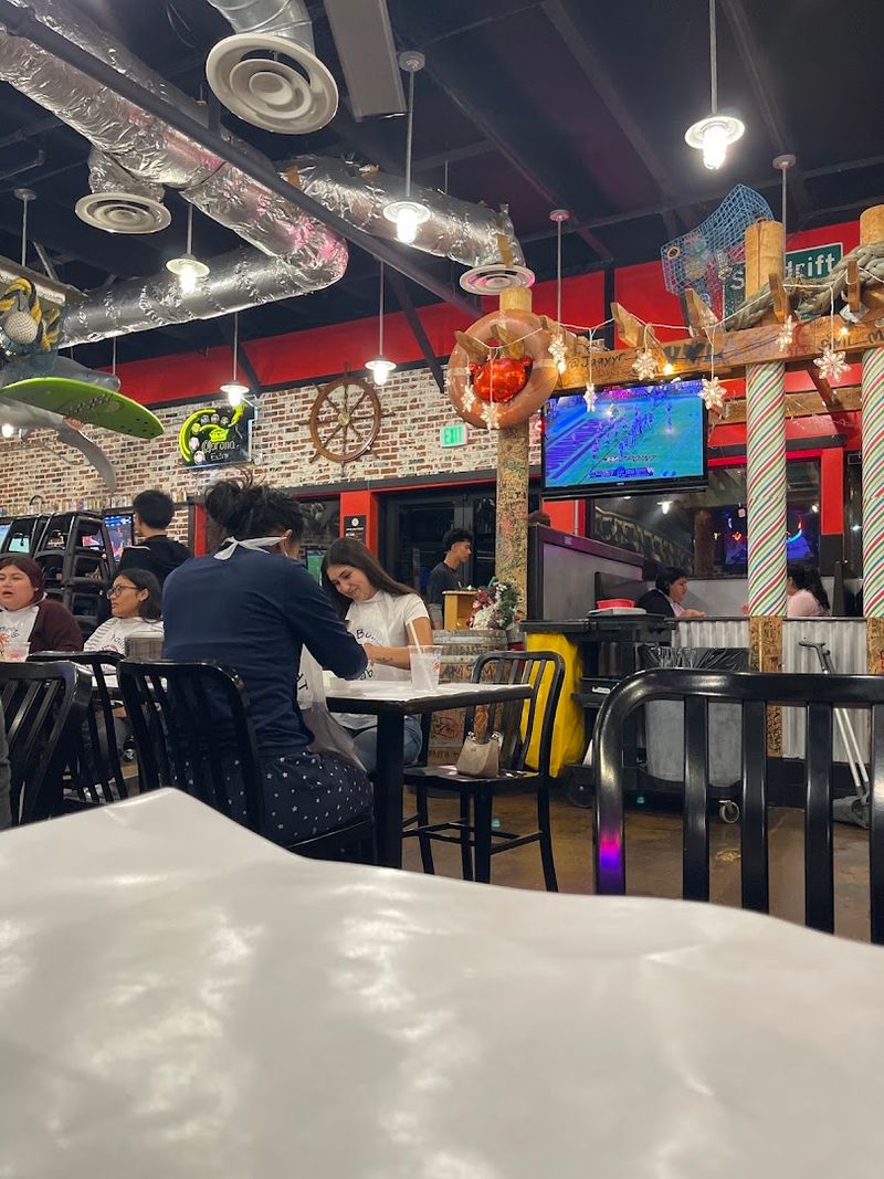 This California Seafood Shack Serves Crab Boils Straight From A Steaming Bag - Decor Hint Put On The Bib Before The Sauce Starts Flying