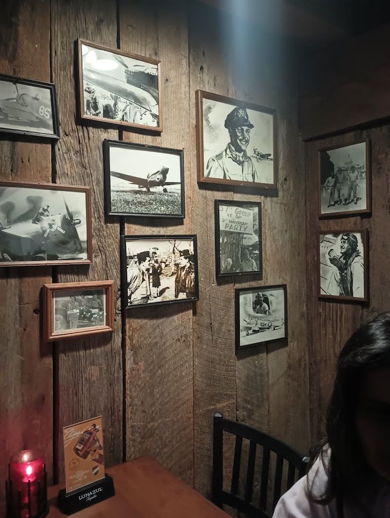 This Georgia Airport Restaurant Serves Sunday Brunch With Runway Views - Decor Hint The Wall Of Heroes And The Stories Behind The Theme